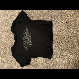 Black cropped shirt with a print on it from garage